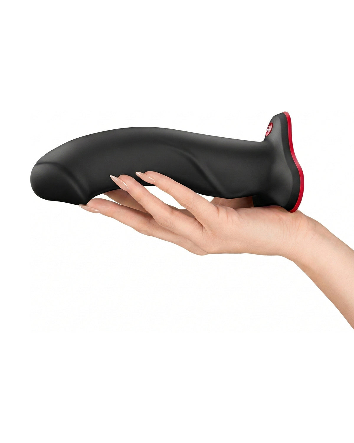 Czarne dildo Fun Factory trzymane w dłoni, pokazujące rozmiar i ergonomiczny kształt produktu