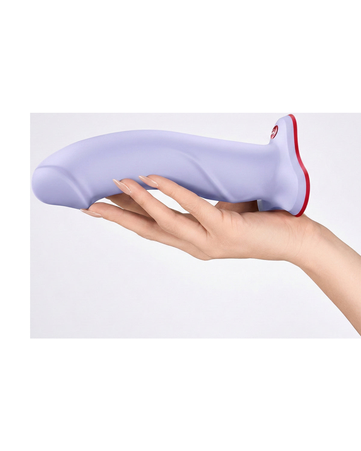 Dłoń trzymająca fioletowe dildo, pokazująca rozmiar i ergonomiczny kształt produktu