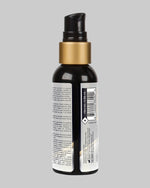 Tył butelki lubrykantu silikonowego Sensuva Premium 57 ml, widoczny skład (Dimethicone, Cyclopentasiloxane) i kod kreskowy. Produkt z Sex Shop Kraków COCO Butik.