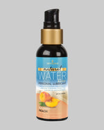 Butelka naturalnego lubrykantu wodnego Sensuva o smaku aksamitnej brzoskwini, widoczna od przodu, z etykietą "natural WATER BASED FLAVORED PEACH" i logo Sensuva. Wegański, do nabycia w COCO Butik.