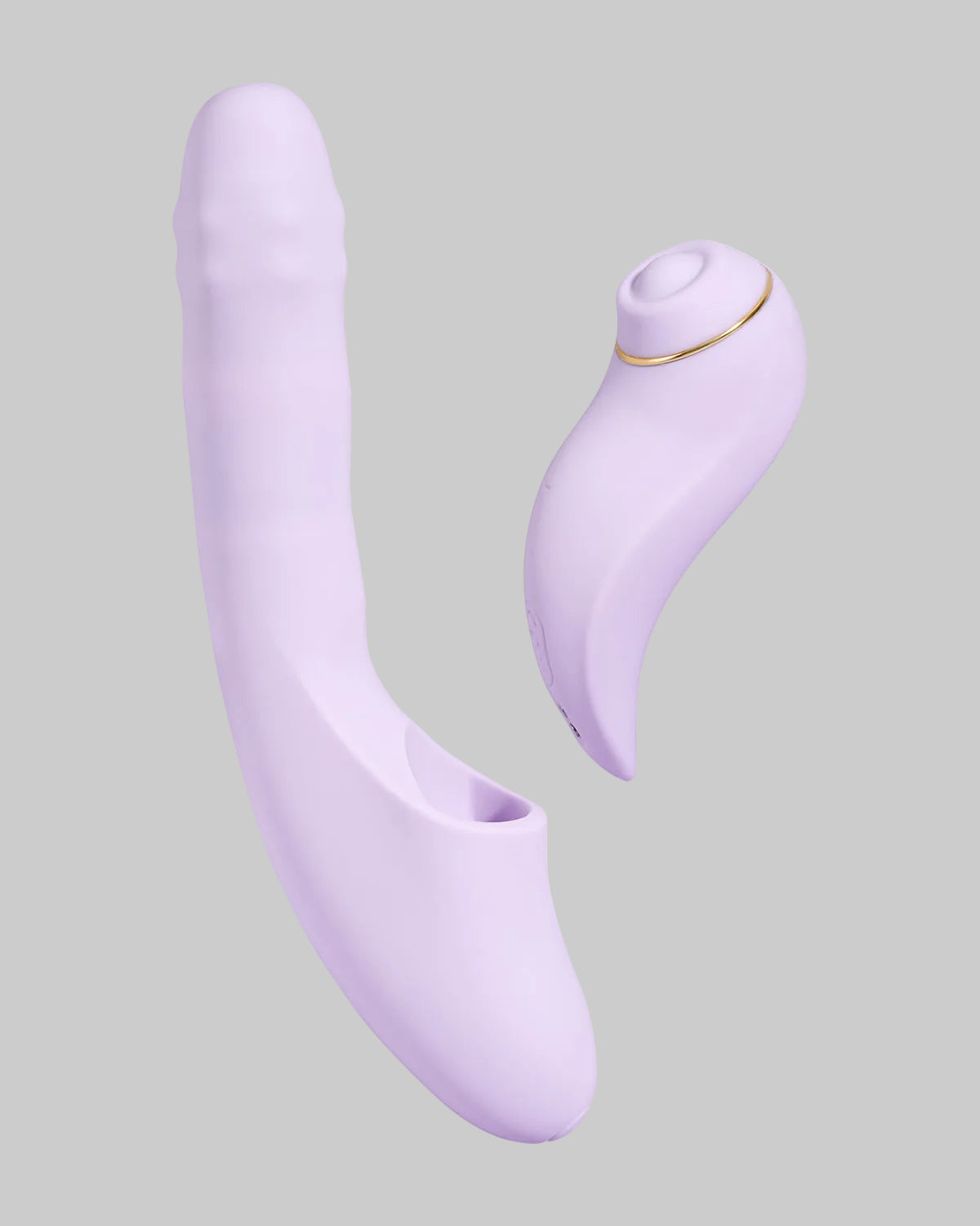 Dwuczęściowy fioletowy wibrator Svakom rozłożony na części, główna część i stimulator clitoris